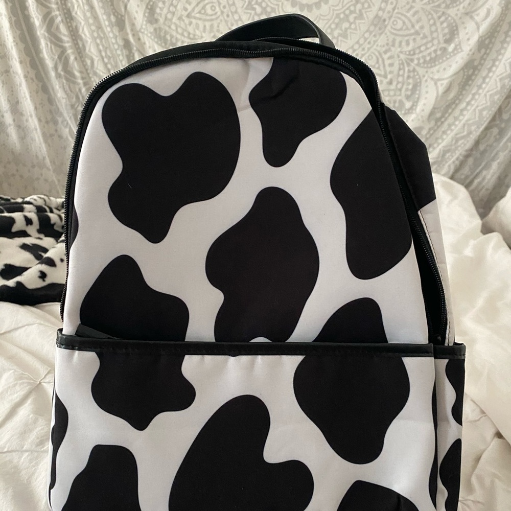 cow print backpack
